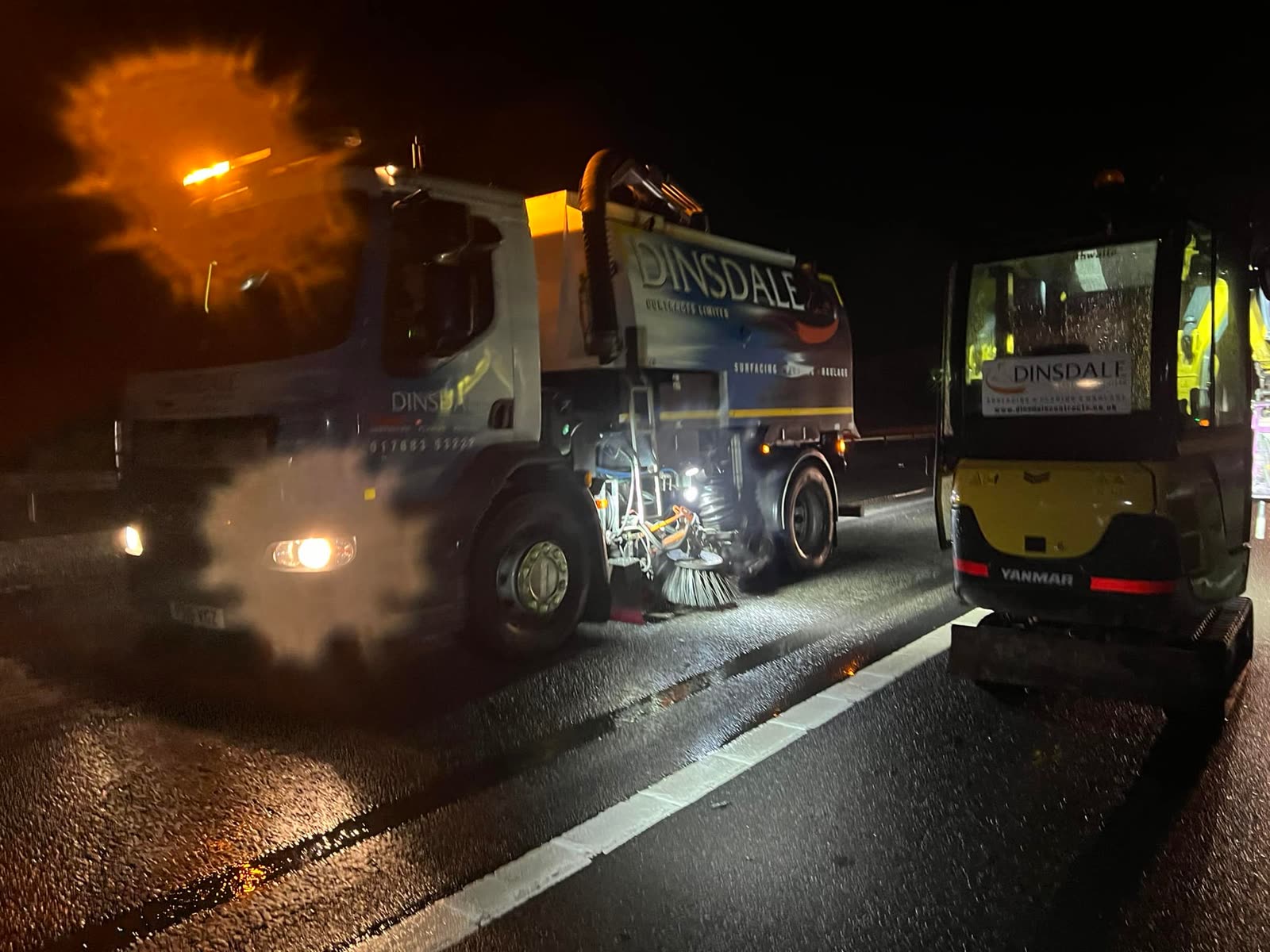 Dinsdale road sweeper working at night on a wet carriageway